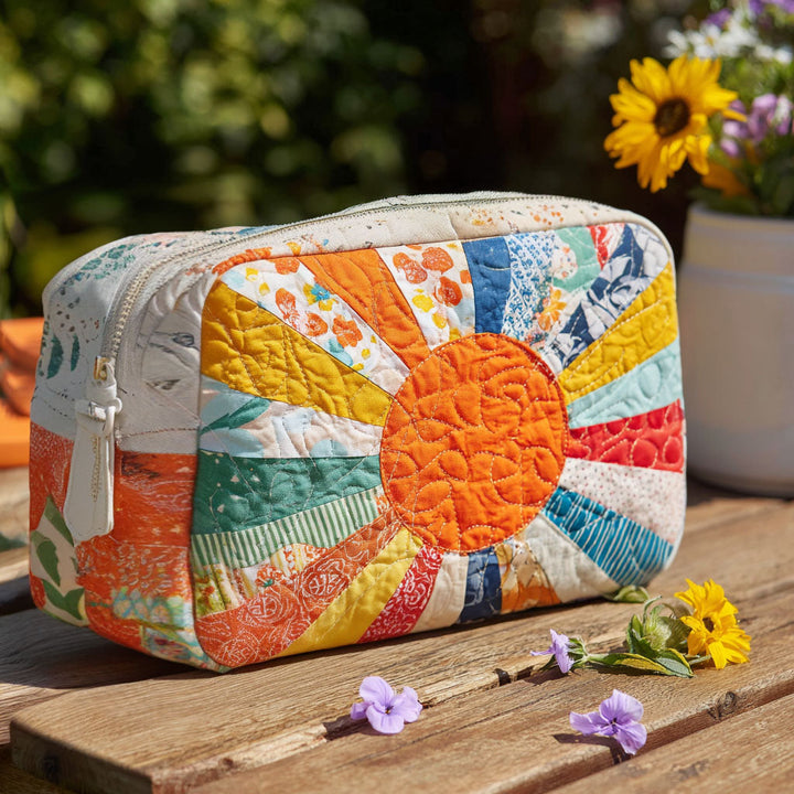 Trousse de maquillage matelassée rayon doré – vue 1 – Maria Milano